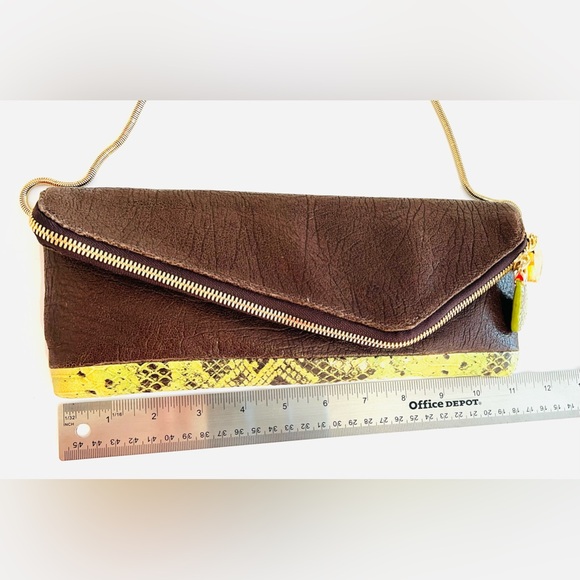 Henri Bendel leather fold over asymmetrical slim clutch